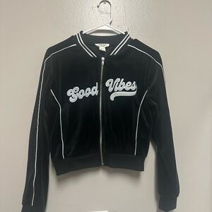 Refuge Black Jacket with White Accents